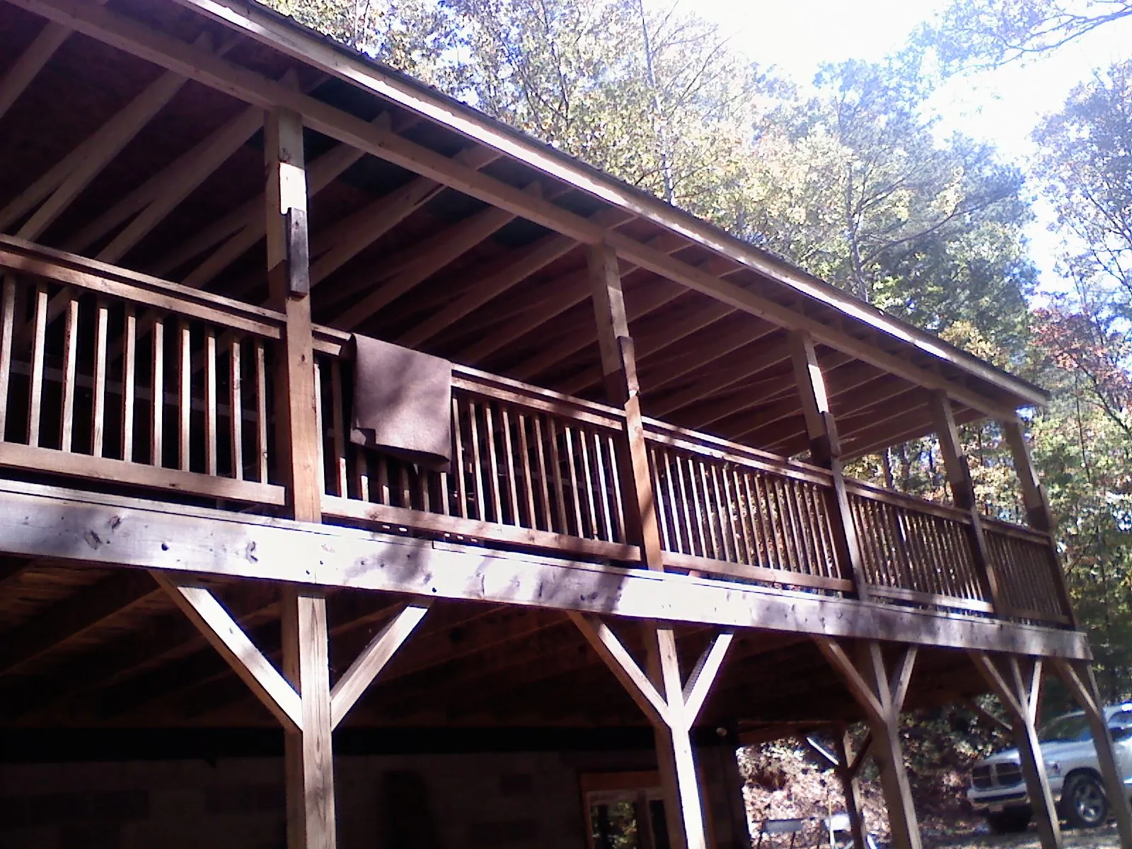 Timber framing under a new elevated porch and deck — Roof Leak Repair in Carle Place by Roofing Brothers